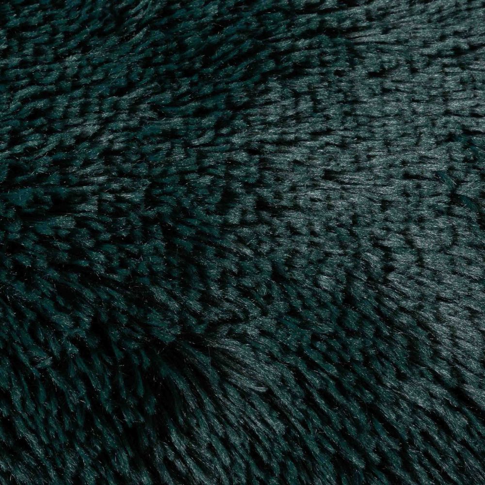 Nahaufnahme des grünen Plüschstoffs am Hundebett WOLKE